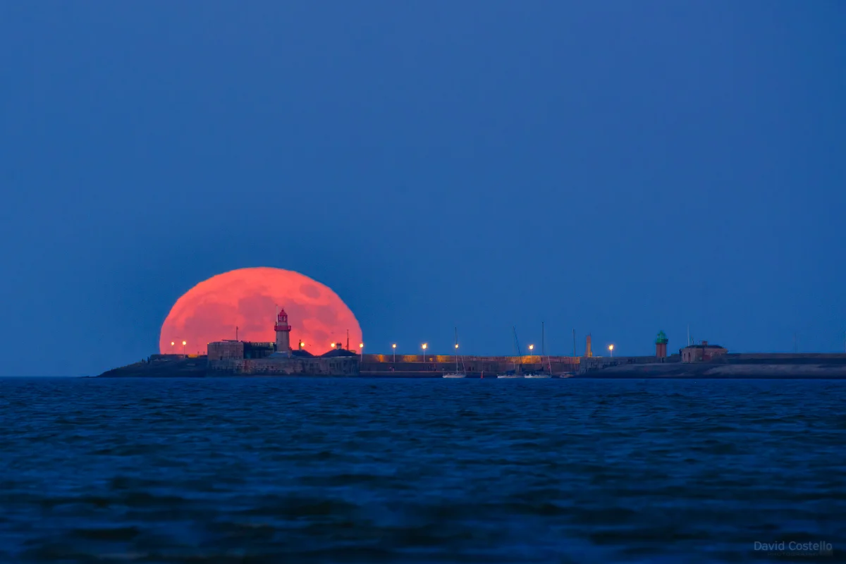 The Supermoon rising above Dun Laoghaire from Poolbeg.