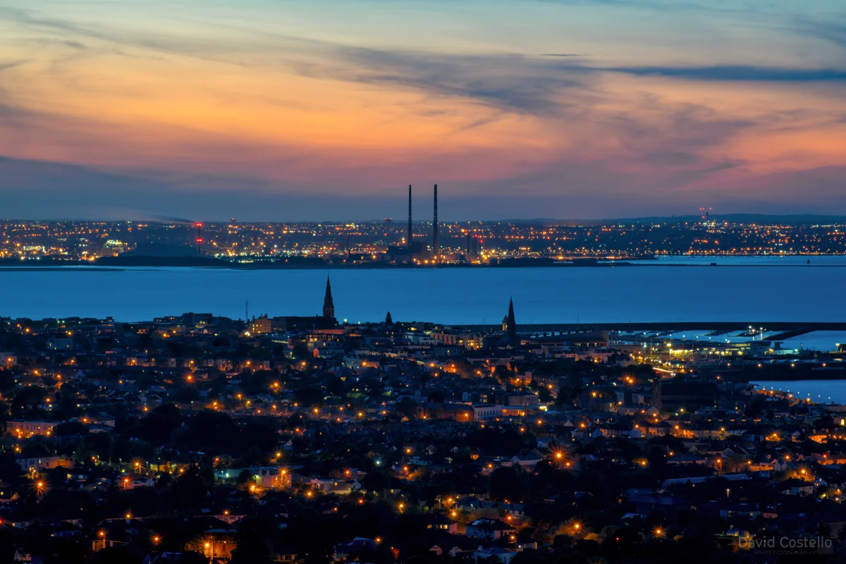 Looking out from Dalkey Hill after the sunset, over Dun Laoghaire and across the evening blue waters on Dublin Bay.