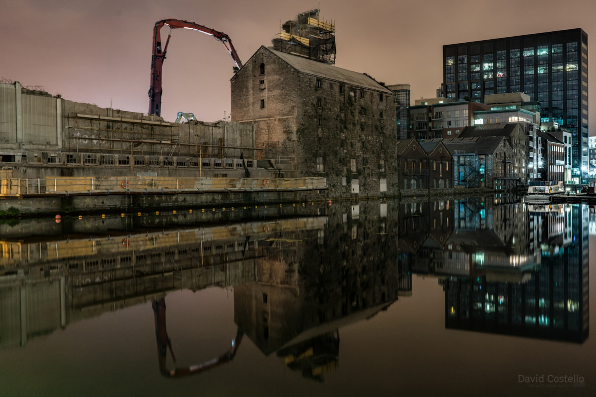 The last of the towering blocks at Bolands Mill are removed as the Google HQ building looks on.