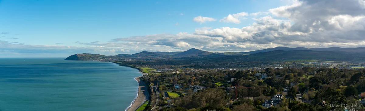 Panoramic view from Killiney Hill towards Bray and wrapping around inland to the Dublin mountains.