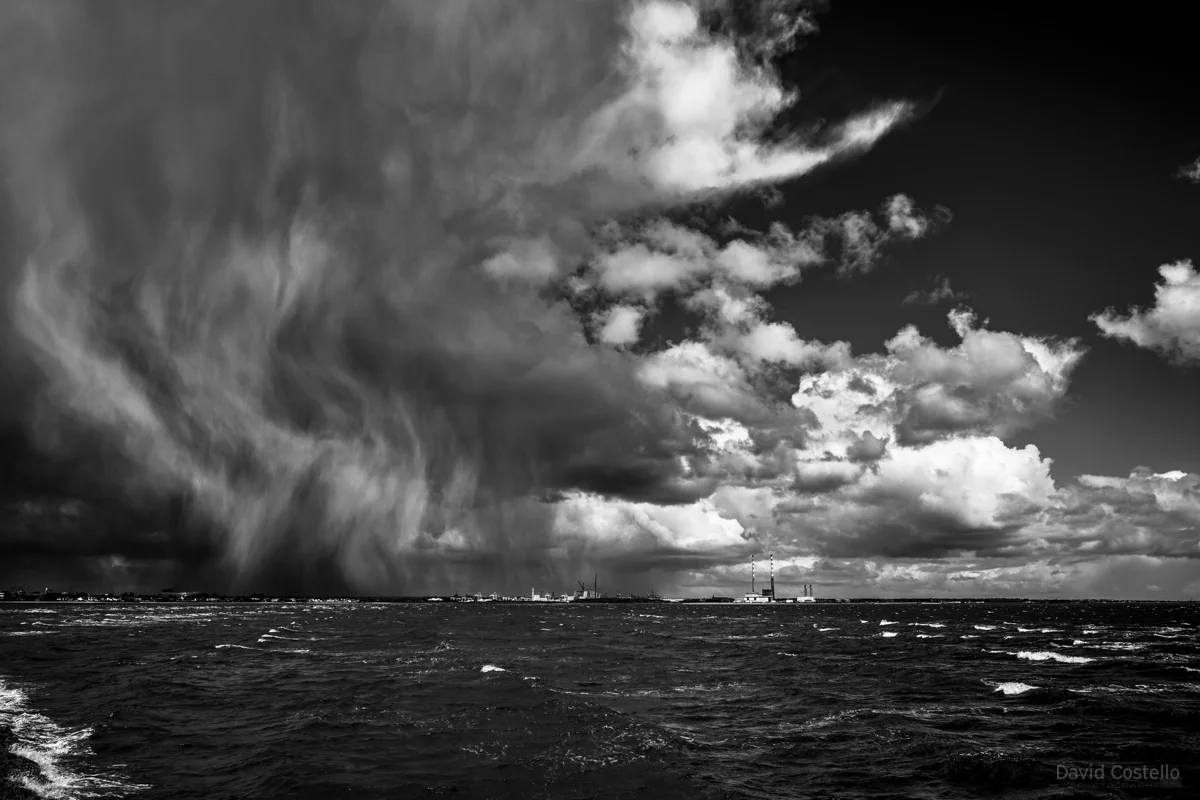 Dublin Bay as a storm of hail and rain falls while passing through on a spring day of every season.