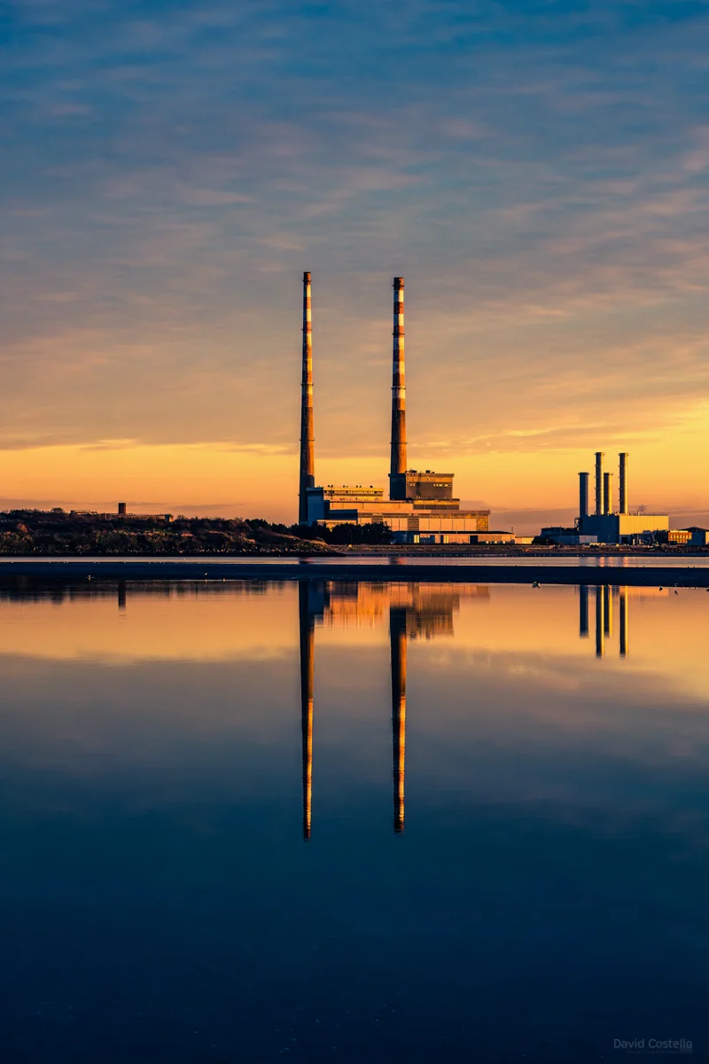 An early winter sunrise illuminates the Pigeon House Chimneys as the low winter sun lights up the iconic Dublin landmark
