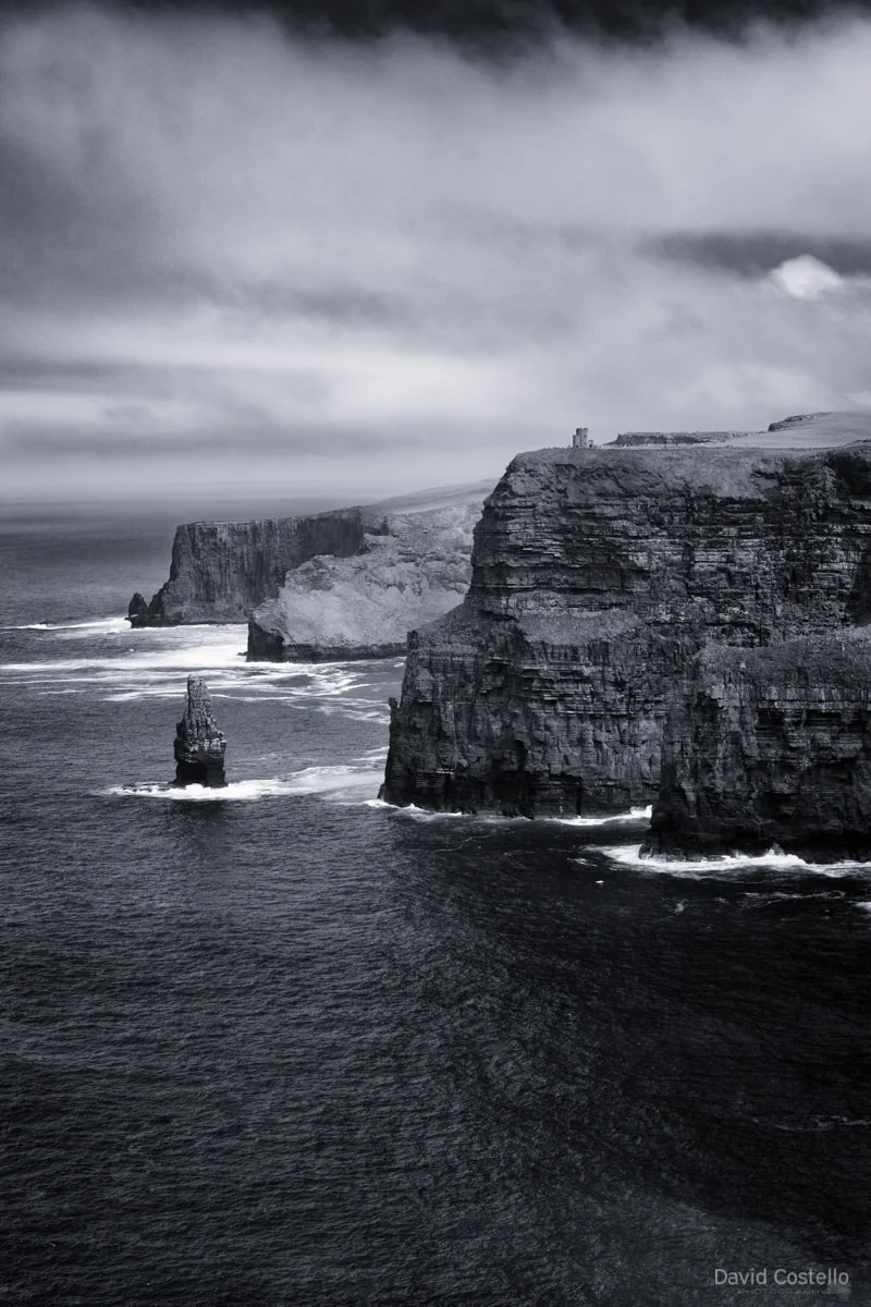 Looking over the Cliffs of Moher on The Wild Atlantic Way towards O'Brien's Tower on a beautiful summer afternoon.