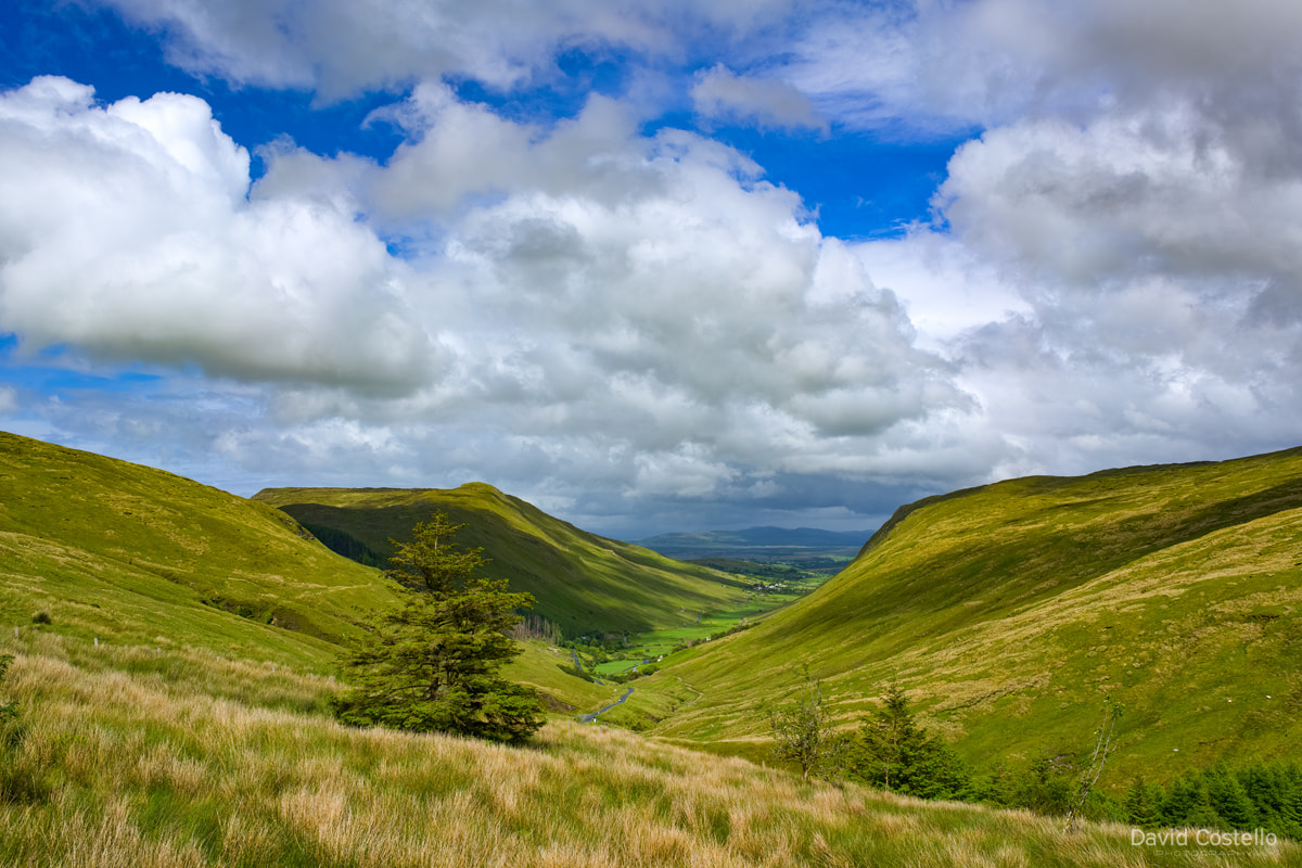 Looking down the winding road of Glengesh pass towards Ardara, a beautiful glacial valley in south west Donegal.