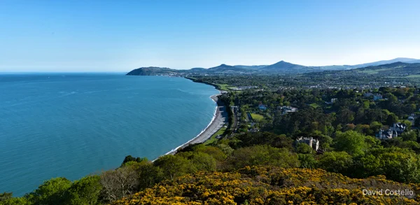 View of Killiney beach towards Bray and the Sugarloaf mountain from the top of Killiney Hill.