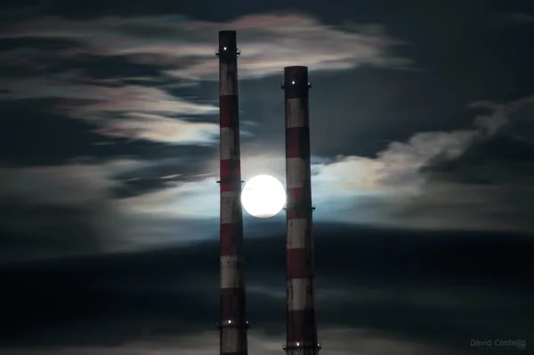 The full moon rising between the Poolbeg Chimneys in January 2014.