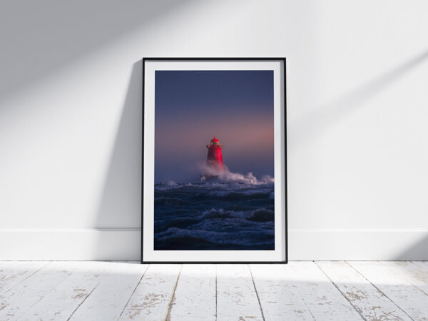 Poolbeg Lighthouse Storm print in a classic handmade black wooden frame.