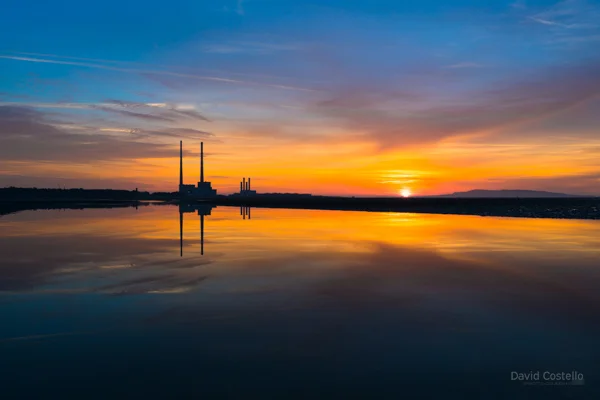 The sunrise while looking north on Sandymount Strand.