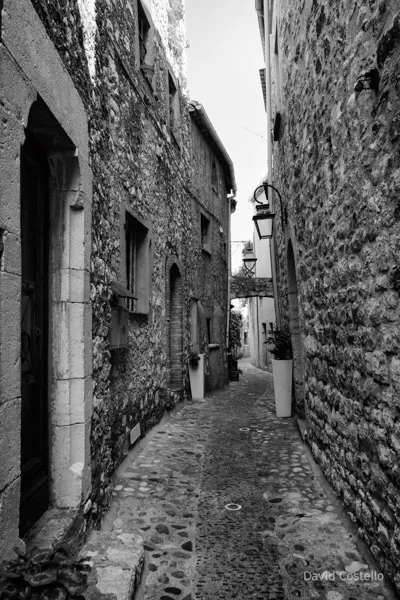 A winding narrow pathway through the houses in Saint Paul de Vence.